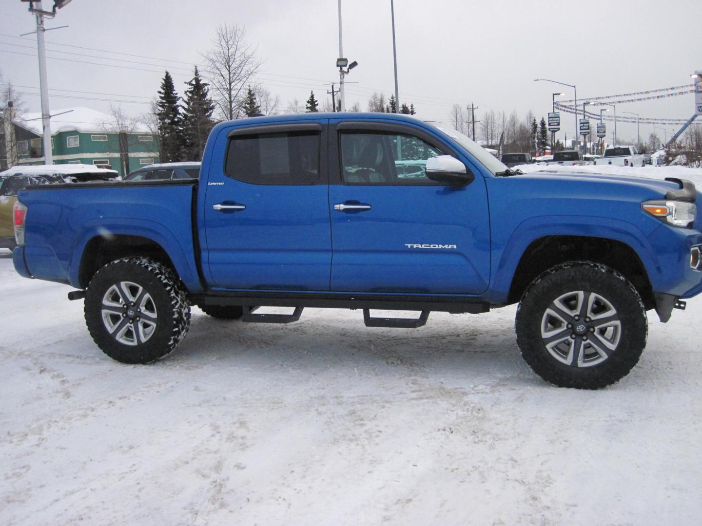 2016 blue /brown Toyota Tacoma Limited Double Cab V6 6AT 4WD (5TFGZ5AN7GX) with an 3.6L V6 DOHC 24V engine, 5A transmission, located at 9530 Old Seward Highway, Anchorage, AK, 99515, (907) 349-3343, 61.134140, -149.865570 - Photo#2